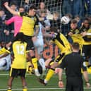 Hawks and Tonbridge Angels players contest a corner. Picture by Dave Haines