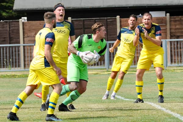 Moneys keeper Callum McGeorge in possession during the 8-0 friendly win at Arundel. Picture by Steven Goodger.