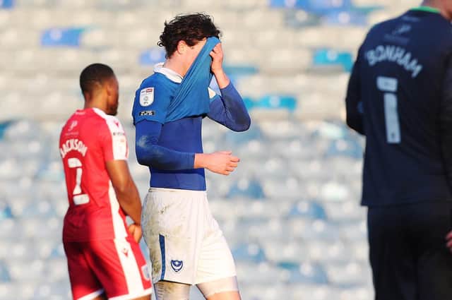 Rasmus Nicolaisen hides his head after Pompey's draw with Gillingham today.