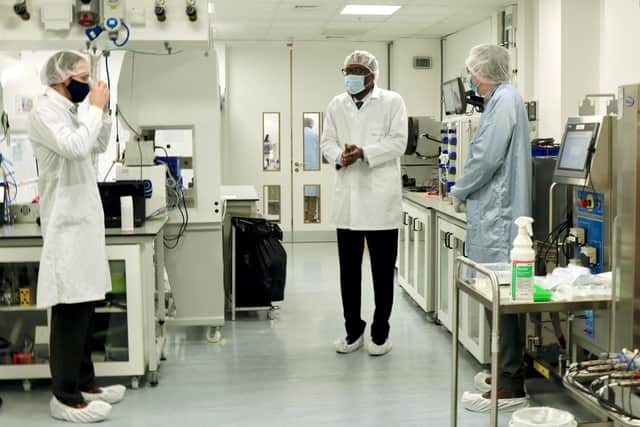 Business secretary Kwasi Kwarteng picture, centre, visiting scientists at Portsmouth-based Pall Corporation on Wednesday, February 17, as he called on businesses to continue to do all they can to support the vaccine rollout.