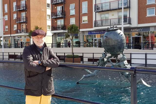 Bob Hawkins in civvies next to the Mine Warfare and Diving Memorial in at Gunwharf Quays in Portsmouth. Picture: Royal Navy.