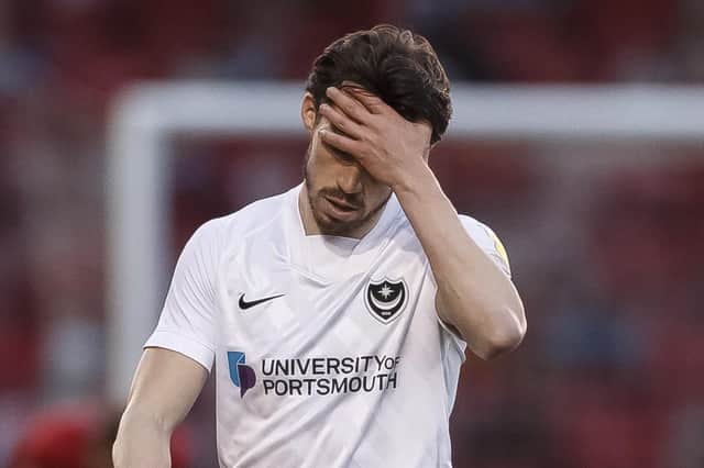 John Marquis dejected after Pompey's draw with Crewe. Picture: Daniel Chesterton/phcimages.com