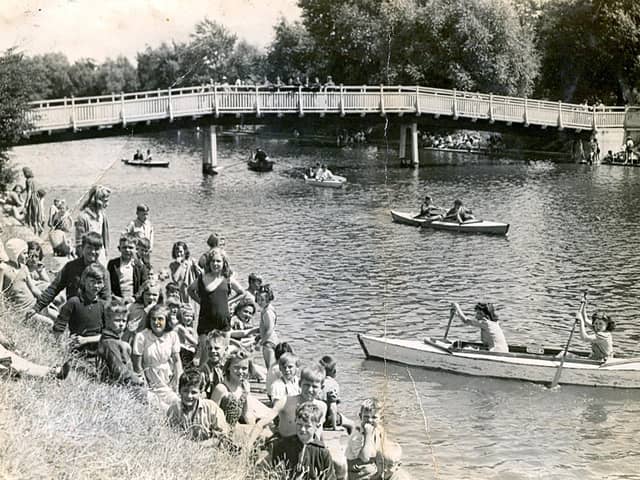 Eileen Mackley in the back of the canoe on the moat at Hilsea Lido