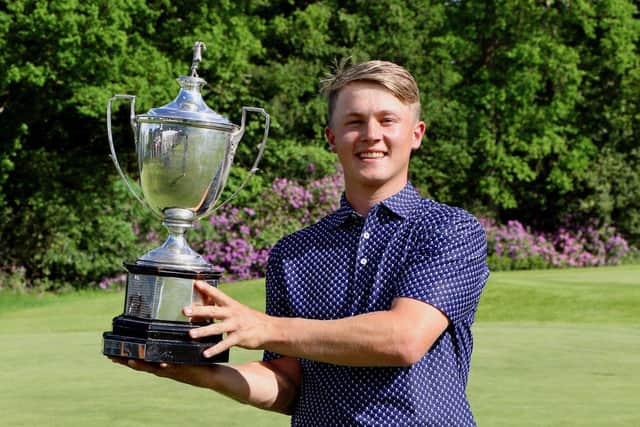 La Moye's Jo Hacker, winner of the Sloane-Stanley Challenge Cup, 100 years after it was first awarded, after beating Hayling's Toby Burden in the final of the 116th Hampshire, Isle of Wight and Channel Islands Amateur Championship. Picture: ANDREW GRIFFIN / AMG PICTURES
