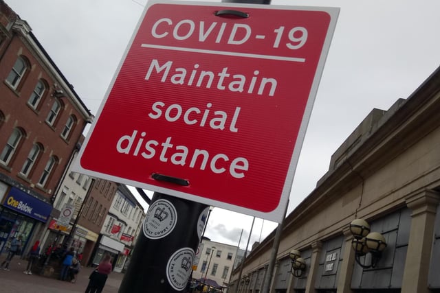 Signs are in place to warn people to stay apart in Doncaster town centre