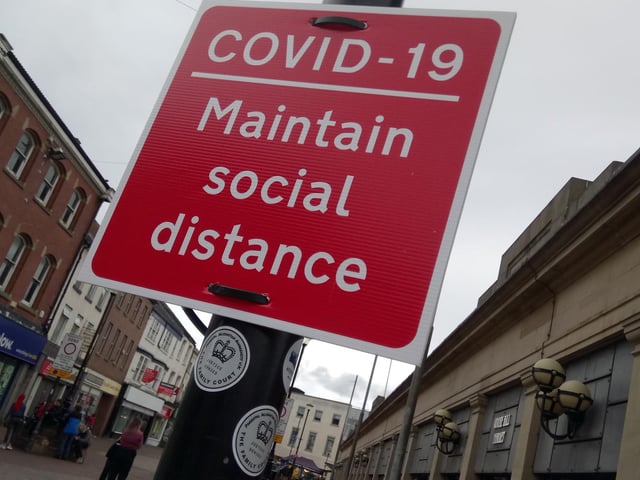 Signs are in place to warn people to stay apart in Doncaster town centre
