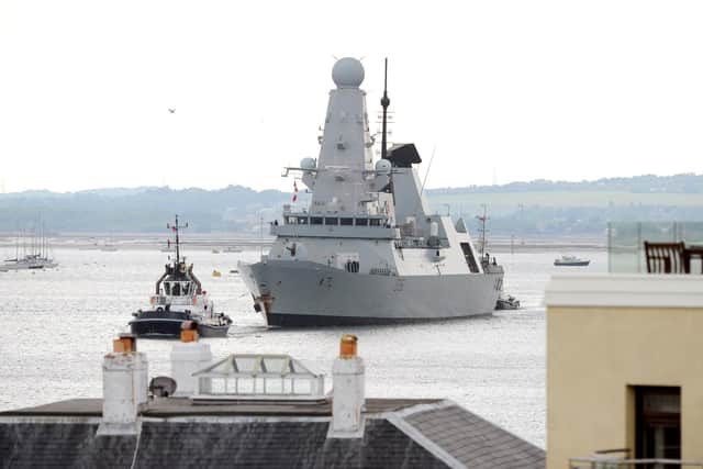 HMS Defender leaving Portsmouth on Friday, June 12.
Picture: Sarah Standing (120620-4093)