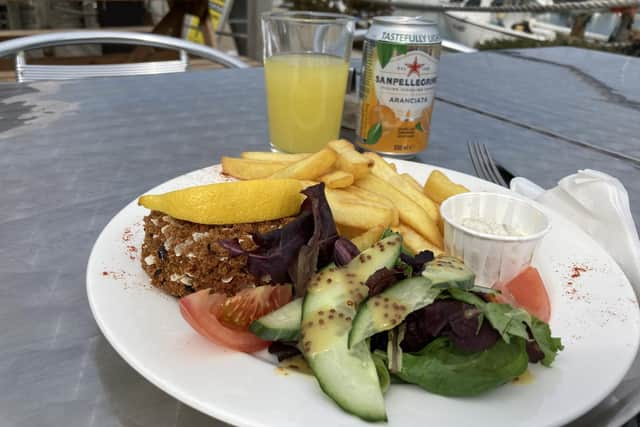 Thai fishcakes with chips and salad.