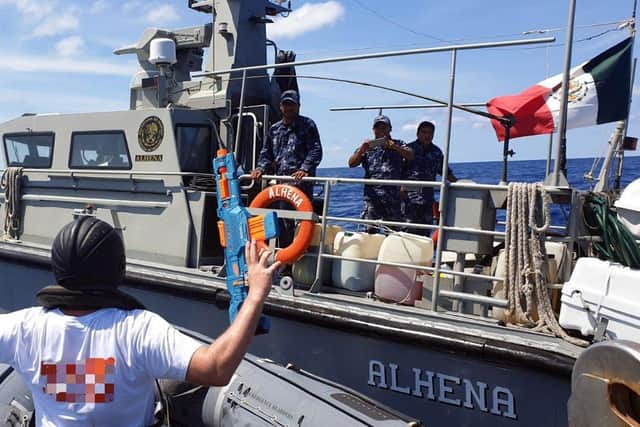 The crew of the Mexican patrol boat Alhena apprehend Medway's 'drug smugglers'.