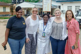 Caroline Dinenage, second left, on her visit to Sierra Leone.