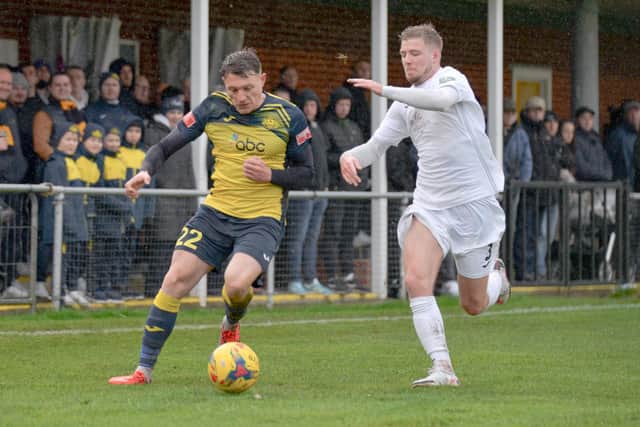 Kieron Roberts, left, battles for possession during Moneyfields' FA Trophy tie with Truro. Picture: Martyn White.