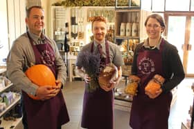 Owner Graham Collett with general manager Harry King (centre) and Kayleigh Collett in the shop.