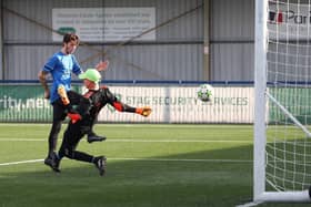 Eastney's Harry Ainsley scores his side's fourth goal. Picture: Stuart Martin