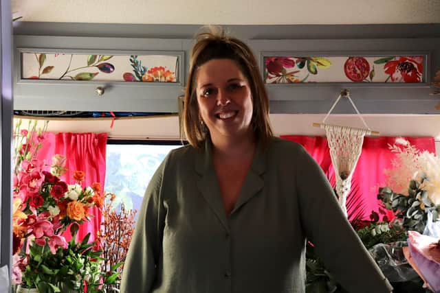 Claires Floristry is running a charity campaign that uses selfies to raise money for a domestic abuse charity. Pictured is owner Claire Lester.