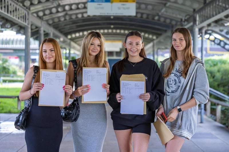 Smiles all round from Crookhorn College students on GCSE results day. Pictured: Caitlin Kirk, Bella Roe, Aimee Pearson and Emily Manson. Picture: Mike Cooter (240823)