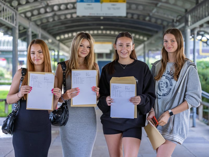 Smiles all round from Crookhorn College students on GCSE results day. Pictured: Caitlin Kirk, Bella Roe, Aimee Pearson and Emily Manson. Picture: Mike Cooter (240823)