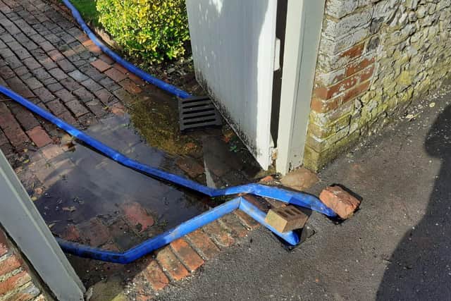 Hambledon residents have had to pump water out of their flooded cellars.