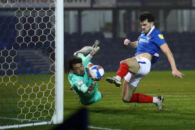 John Marquis opens the scoring for Pompey in tonight's victory over AFC Wimbledon. Picture: Bryn Lennon/Getty Images