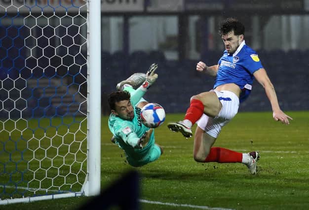 John Marquis opens the scoring for Pompey in tonight's victory over AFC Wimbledon. Picture: Bryn Lennon/Getty Images