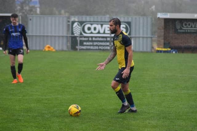 Ellis Martin during his debut for Moneyfields Reserves in the Dover Road rain against Clanfield. Picture: Dan (JMA Media).