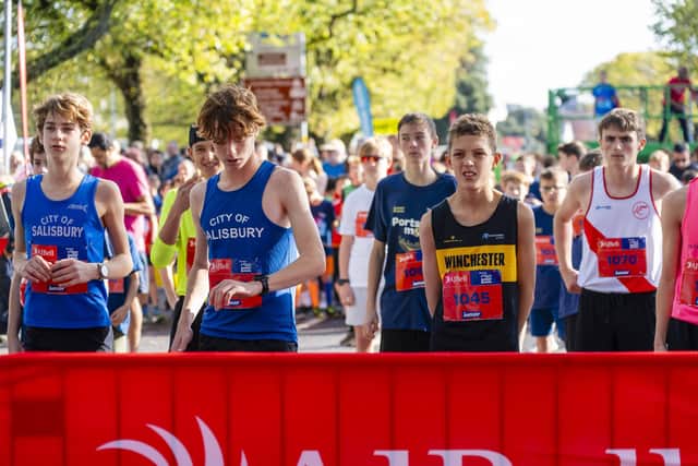 The young runners get into the zone before the start of the run.