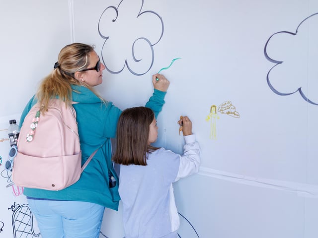 Rebecca with her daughter Katie painting a dream journey.  Picture:Marcin Jedrysiak