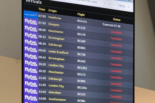 The flight departure boards showing cancelled flights at Belfast Airport as Flybe, Europe's biggest regional airline, has collapsed into administration. Picture: David Young/PA Wire