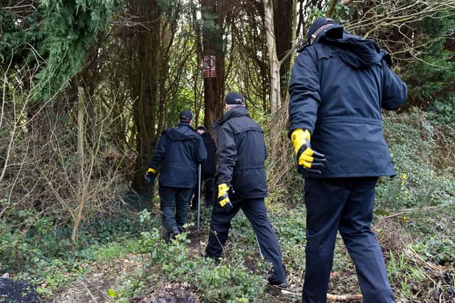 Police perform a sweep at the scene. Picture: Solent News & Photo Agency