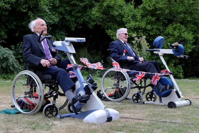Normandy Veterans Peter Hawkins and Len Gibbon after they finished their 104-mile cycling challenge, to commemorate anniversary of the Normandy landing. Photo:: Gareth Fuller/PA Wire