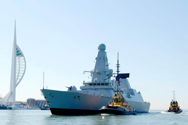 HMS Defender pictured sailing into Portsmouth. The ship has been at the centre of an international incident after Russia claimed its forces had fired a warning shot at the ship in the Black Sea. Britain has denied this happened.