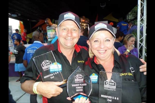 Cheryl Spencer with her highest placed female award next to husband, Barry.