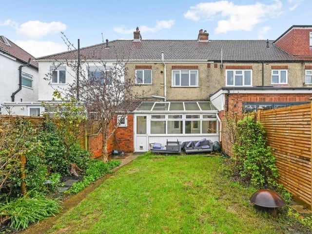 The listing says: "With no forward chain this three bedroom 1930s home boasts stunning original features, parking for two cars and garage to the rear. Internally it benefits from a conservatory, ground floor cloakroom and westerly facing rear garden. Positioned within the sought after Court Lane area of Drayton, close to local schools and parks - it's a great family or first time purchase."