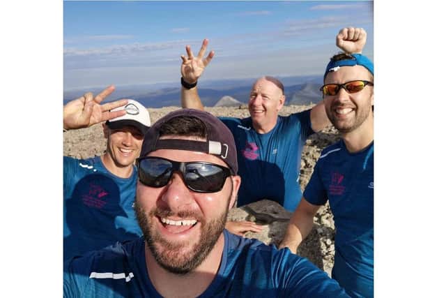 Supporters of Emsworth charity Verity's Gift completed the Three Peaks Challenge by running up each mountain and cycling between them. Pictured: Nick Slade, Philip Robertson, George Turner and Mike Magill on top of Ben Nevis