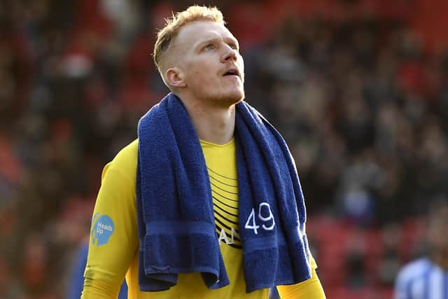Sheffield Wednesday stopper Cameron Dawson is being targeted by League Two outfit Exeter.