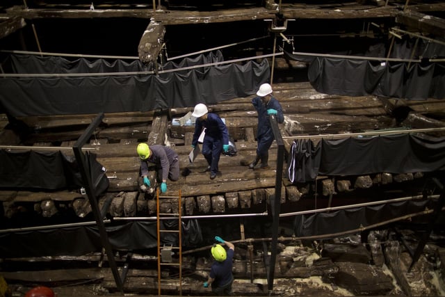 Conservators work on the remains of the Mary Rose at the new Mary Rose Museum at Portsmouth's Historic Dockyard on May 16, 2013. Picture: Dan Kitwood/Getty Images