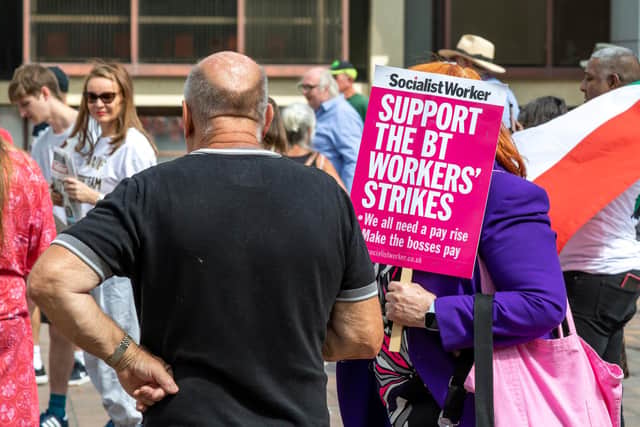 Signs on display at the rally in Guildhall Square. Picture: Mike Cooter (200822)