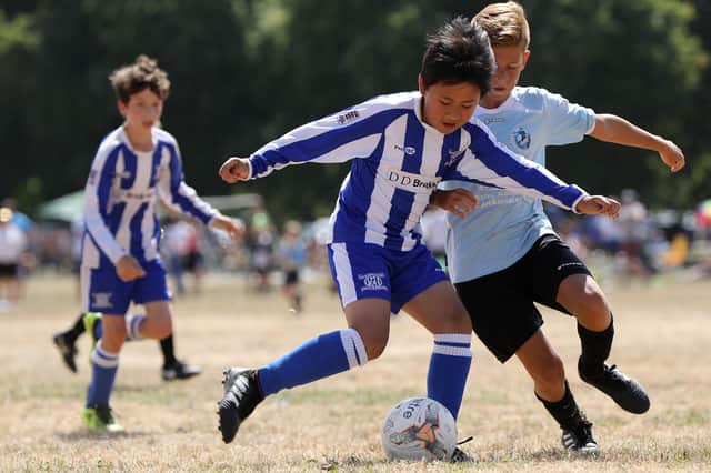Hayling St Andrews U11s (in stripes) v Skillful Soccer Panthers U11s (sky blue). Fleur de Lys Youth Football Tournament, King George V Playing Field, Portsmouth                         Picture: Chris Moorhouse                             Sunday 22nd July 2018                 FOR EDITORIAL USE ONLY