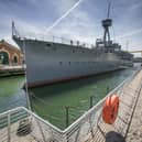 Staff at the National Museum of the Royal Navy have called for the government of Northern Ireland to 'stop dithering' over the fate of HMS Caroline in Belfast.