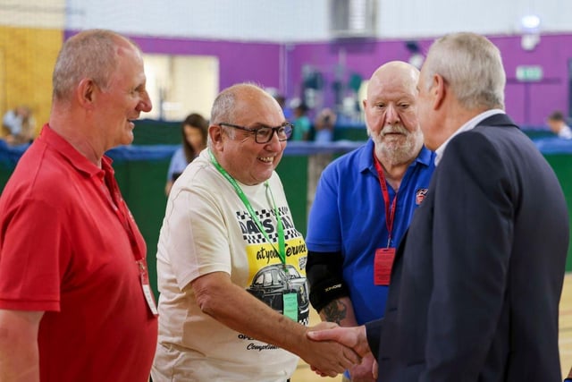Blind veterans and their human dogs with the CEO of Blind Veterans UK Adrian Bell.