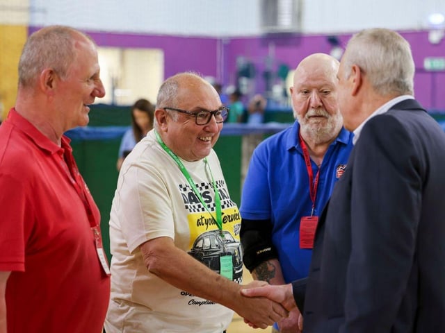 Blind veterans and their human dogs with the CEO of Blind Veterans UK Adrian Bell.