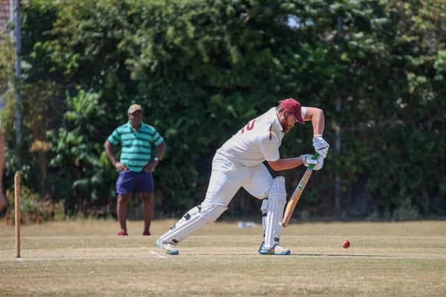 Rob Wood plays a straight bat on his way to a half-century for Gosport 3rds. Photo by Alex Shute