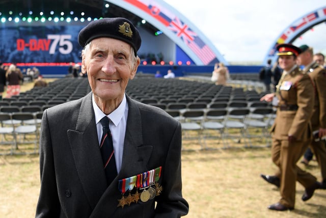 Former British Royal Marine, and D-Day veteran Jim Booth poses for a photograph