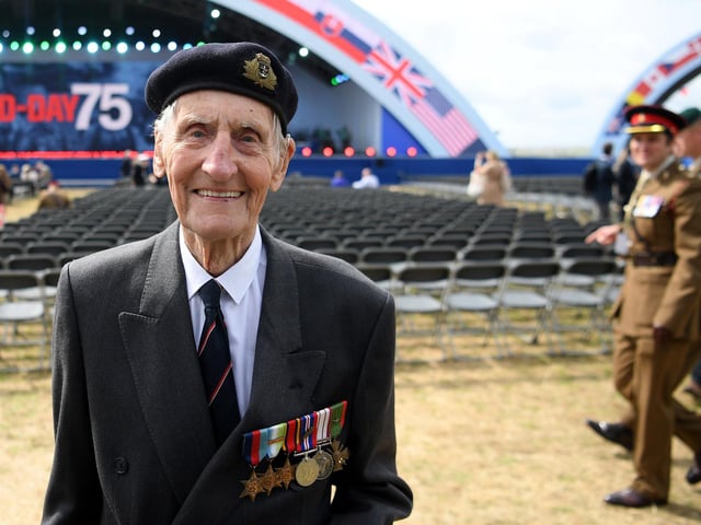 Former British Royal Marine, and D-Day veteran Jim Booth poses for a photograph