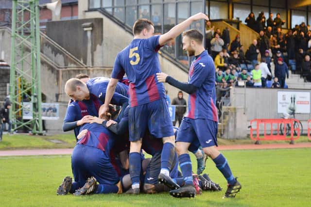 US Portsmouth celebrate Frankie Paige's wonder strike that put them 2-0 up against Millbrook. Pic: Martyn White.