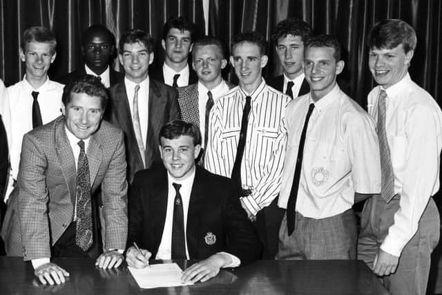 First-team manager Alan Ball poses with Pompey's new intake of apprentices in July 1988. They include Stuart Doling (second from right), Darren Anderton, Darryl Powell and Andy Awford