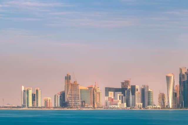 The skyline of West Bay and stony bank view from Museum of islamic art during sunset Doha, Qatar