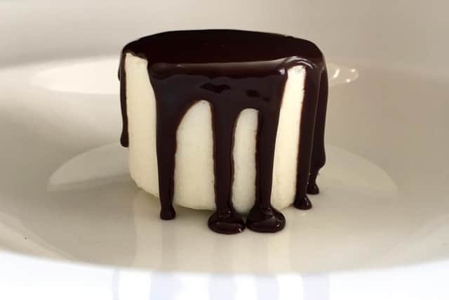 Iced milk and chocolate sauce by Lawrence Murphy