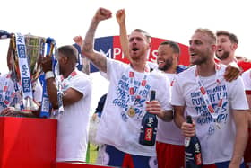 Former Pompey duo Tom Naylor and Jack Whatmough won League One promotion with Wigan last term.   Picture: Charlotte Tattersall/Getty Images