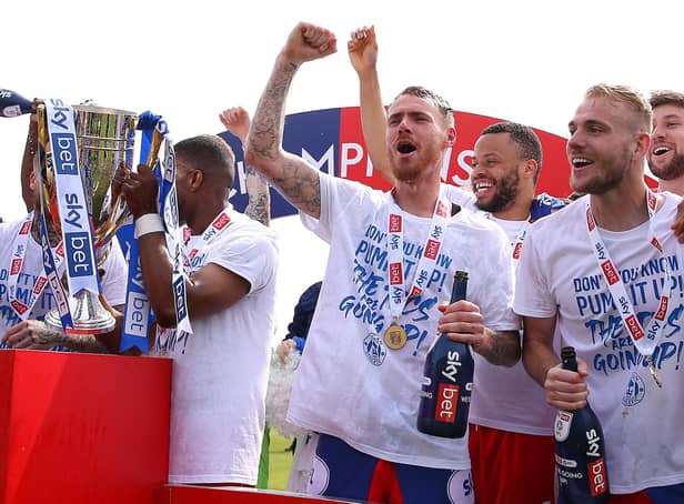 Former Pompey duo Tom Naylor and Jack Whatmough won League One promotion with Wigan last term.   Picture: Charlotte Tattersall/Getty Images