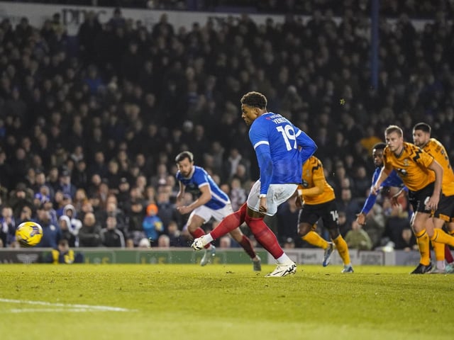 Kusini Yengi draws Pompey level from the penalty spot at the end of the first half